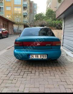 1998 Kia Sephia 1.5 GTX mi 1992 doğan mi